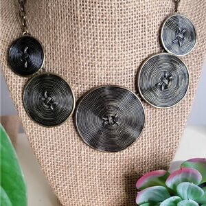 Statement brass style circular necklace with matching earrings
